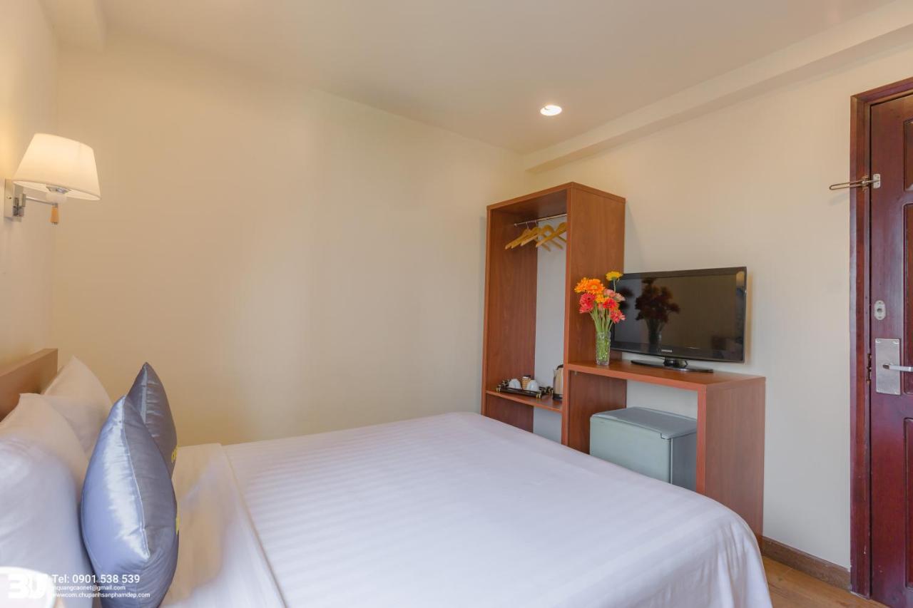 Cosmo Square Hotel Ho Chi Minh City Exterior photo